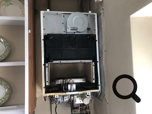 Inside of Potterton Profile, front panel removed and inner combustion chamber cover removed.