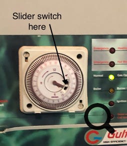 Photo showing time switch and exact location of tiny over-ride button